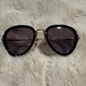 Miu Miu Chic Black and Gold Sunglasses
